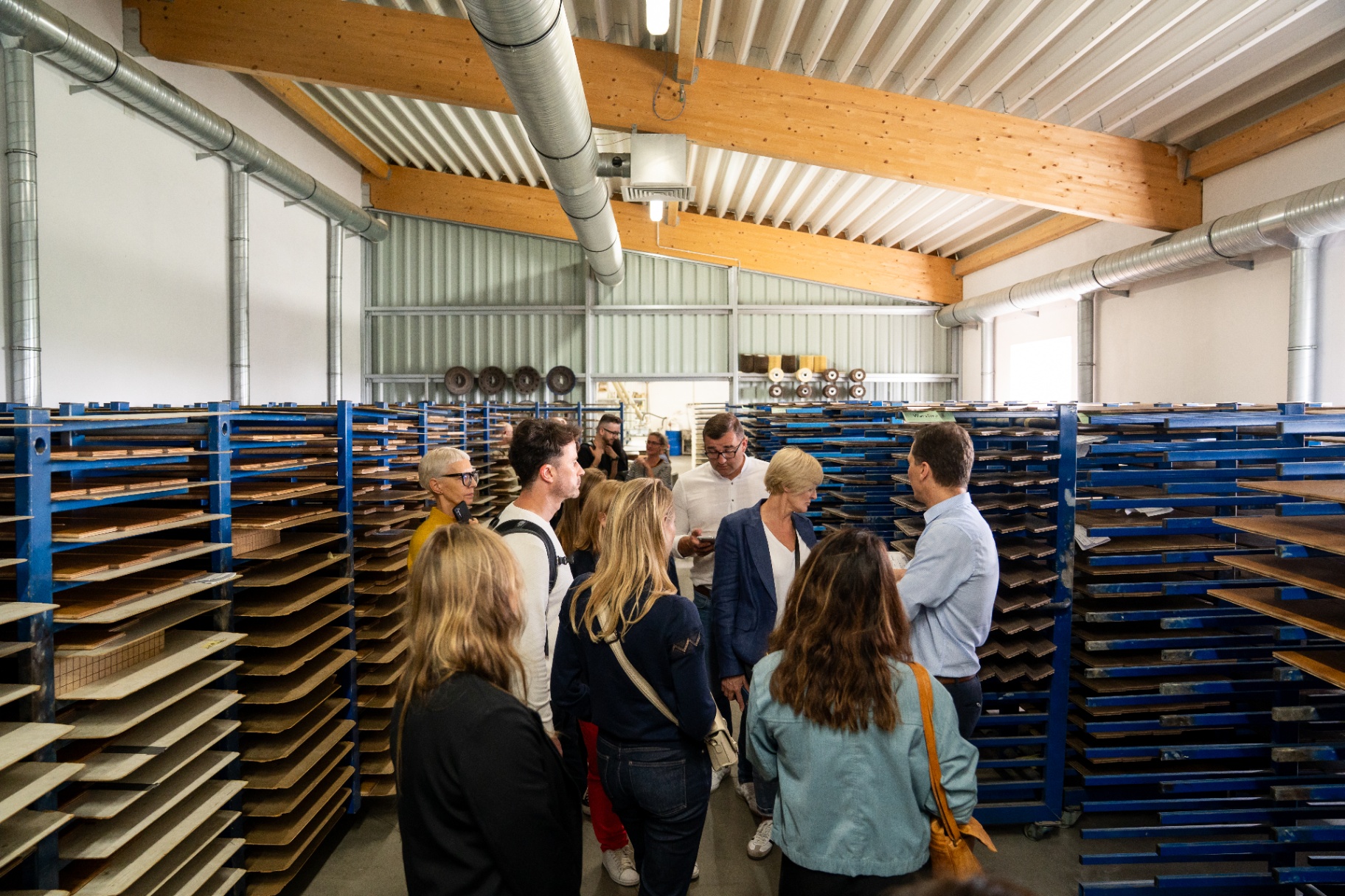 Partners touring the production hall