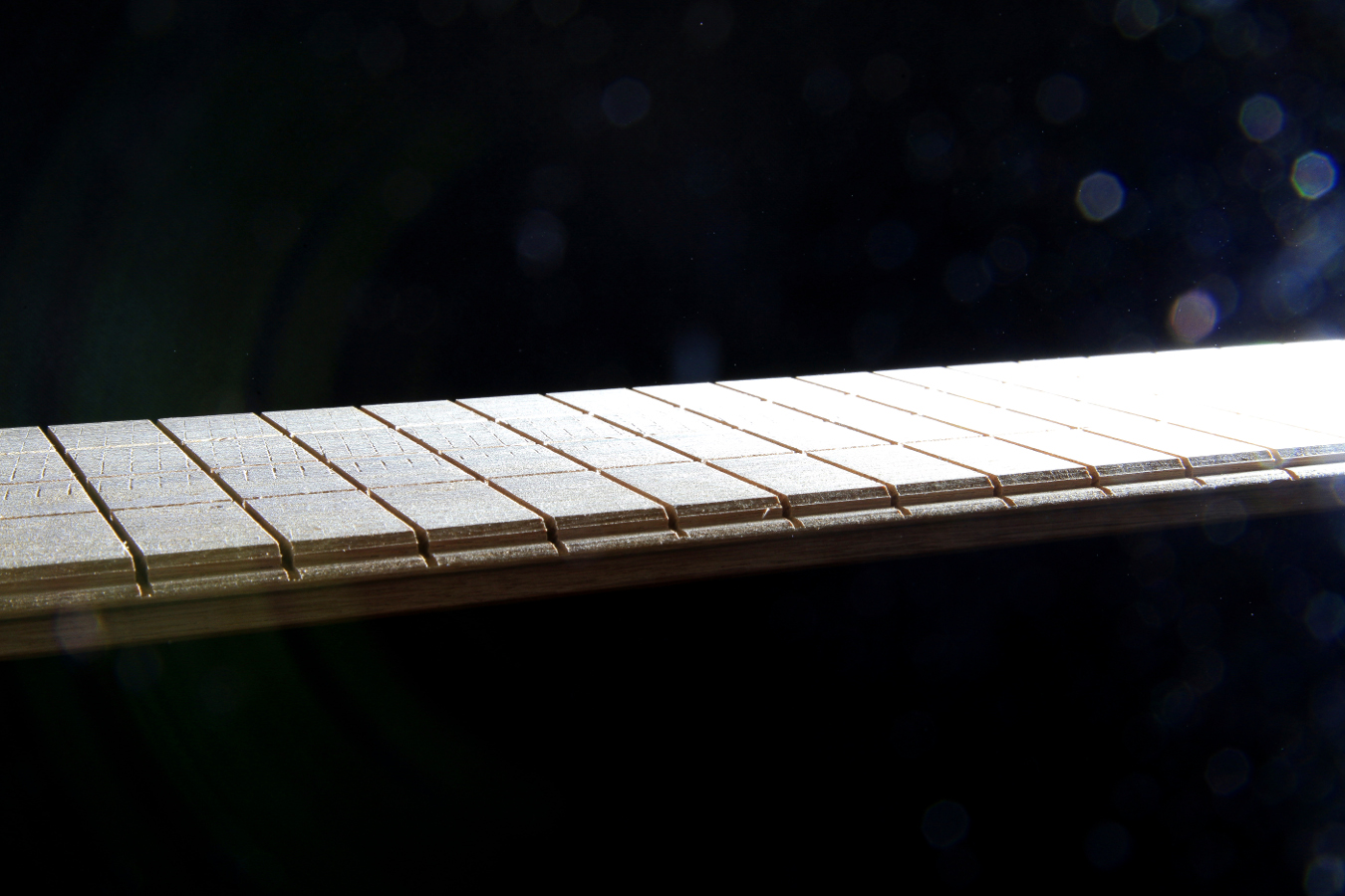 Edge of a solid board against the light